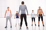 Diverse Group Of People Exercising In Gym Stock Photo