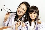 Doctor Checked Children Girl's Body Stock Photo
