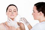 Doctor Gets Botox Injection To A Woman Patient Stock Photo