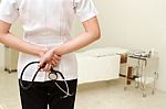 Doctor Holding A Stethoscope Standing Stock Photo
