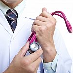 Doctor Holding Stethoscope Stock Photo