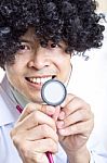 Doctor Holding Stethoscope Stock Photo