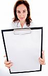 Doctor Showing Her Blank Clipboard Stock Photo