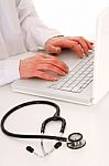 Doctor Working In Computer Stock Photo