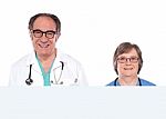 Doctors Showing Blank Board Stock Photo