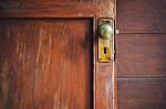 Door Knob And Keyhole Made Of Brass Stock Photo