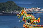 Dragon Sculpture On Roof Of A Chinese Temple Stock Photo