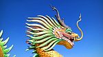 Dragon Statue Under Blue Dragon Sky Stock Photo