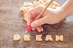 Dream Alphabet Biscuit On Wooden Table Stock Photo