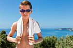 Dutch Boy Holding Towel  And Wearing Swimming Goggles In Front O Stock Photo