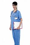 Duty Doctor Posing With Case Sheet In Hand Stock Photo