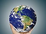 Earth Globe In Hand Stock Photo