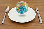 Earth On Plate, Ready For Eat Stock Photo