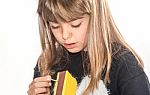 Eight Year Old Girl Playing With Maches Isolatet On White Stock Photo