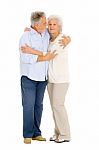 Elderly Couple Enbracing Stock Photo