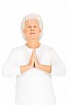 Elderly Woman Practicing Yoga Stock Photo
