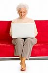 Elderly Woman With Laptop Stock Photo