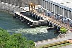 Electricity Generator Front Of Sri Nakharin Dam Stock Photo