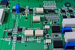 Electronic Circuit Board With Electronic Components Background Stock Photo