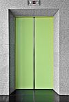 Elevator With Green Door Stock Photo