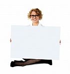 Employee Holding White Blank Banner Stock Photo