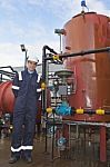 Engineer standing on Oil Refinery Stock Photo