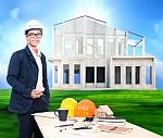 Engineering Man With Working Table And Home Project On Beautiful Stock Photo