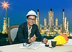 Engineering Man Working On Table Aginst Beautifult Lighting Of O Stock Photo