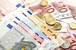 Euro Banknotes With Coins Stock Photo
