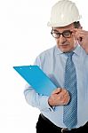 Experienced Architect Holding Files Stock Photo