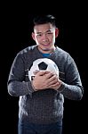 Face Of Soccer Lover Holding Football Ball Isolated Black Background Use For Sport And People Activities Theme Stock Photo
