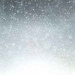 Falling Snow On The Grey Background Stock Photo
