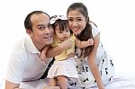 Family Are Relaxing On White Background Stock Photo