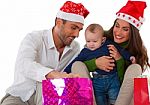 Family Celebrating Their First Christmas Together Stock Photo