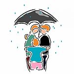 Family Hugging Under Umbrella Stock Photo