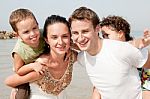 Family In The Beach Stock Photo