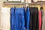 Fashion Clothing On Hangers Stock Photo