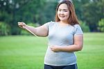 Fat Woman Measuring Her Stomach Stock Photo