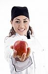 Female Chef Showing Red Apple Stock Photo