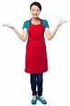 Female Chef Welcoming You With A Smile Stock Photo