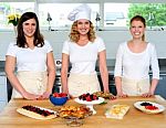 Female Chefs Presenting Snacks Stock Photo
