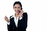 Female Customer Support Executive On Call Stock Photo