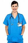 Female Doctor With Stethoscope Around Her Neck Stock Photo
