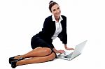 Female Executive Working In Laptop Stock Photo