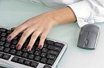 female Hand Operating Keyboard Stock Photo