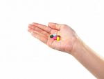 Female Hand With Pills Stock Photo