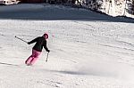 Female Skier In Fresh Powder Snow Stock Photo