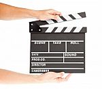 Film Clapper Board With Space And Hand Stock Photo