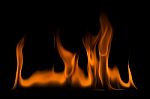 Fire Flames On A Black Background Stock Photo