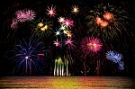 Firework Celebration From The Sea Shore Stock Photo